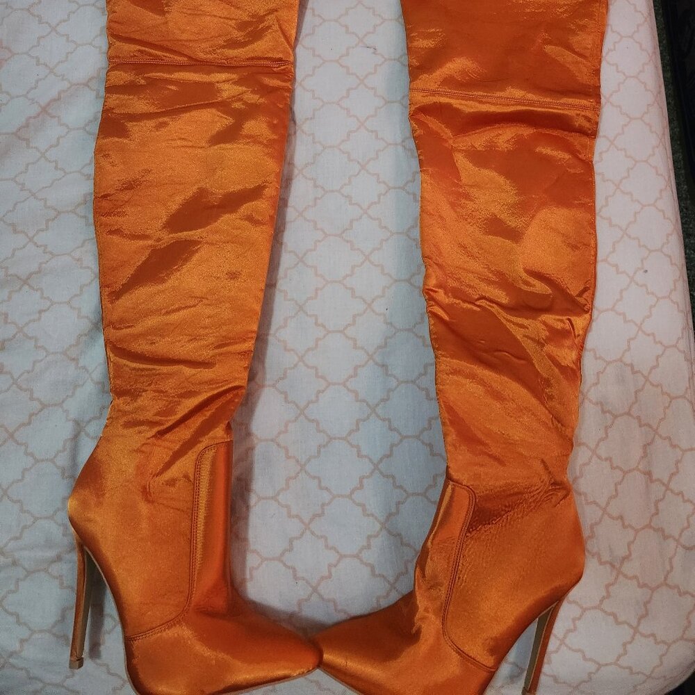 Orange thigh high boots